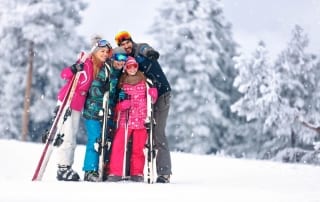 Photo of a Family Skiing in Vail Colorado around Christmastime.