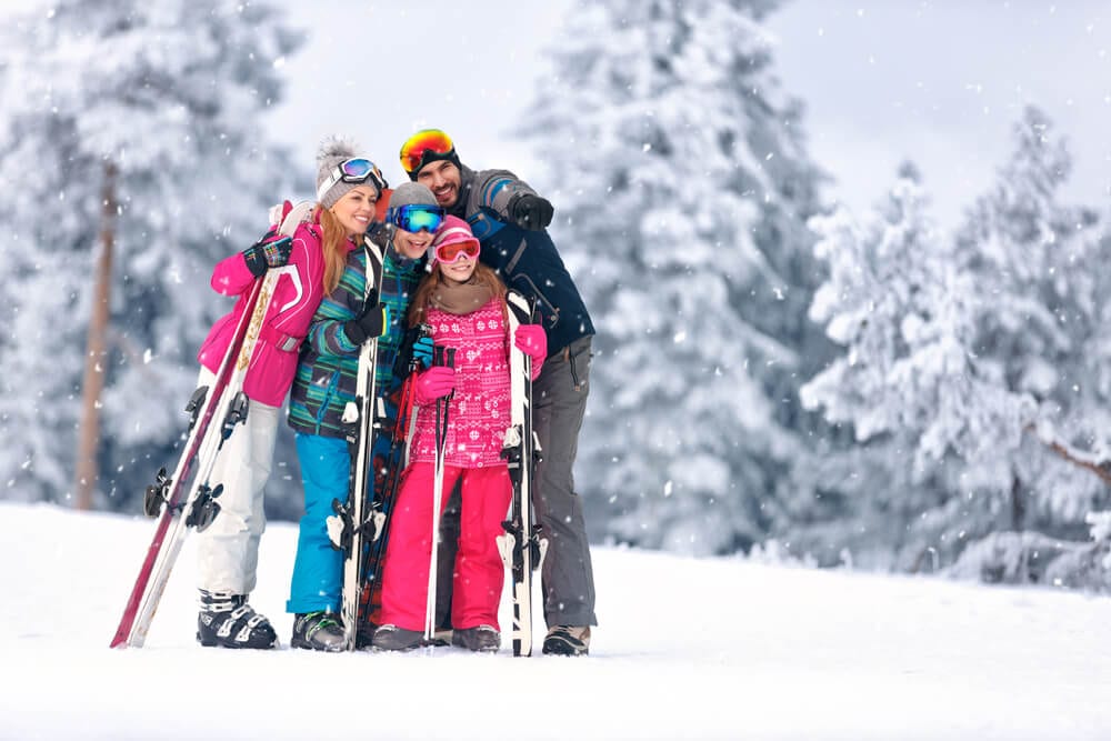 Photo of a Family Skiing in Vail Colorado around Christmastime.