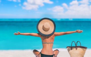 A woman enjoying Beaches In Turks And Caicos.